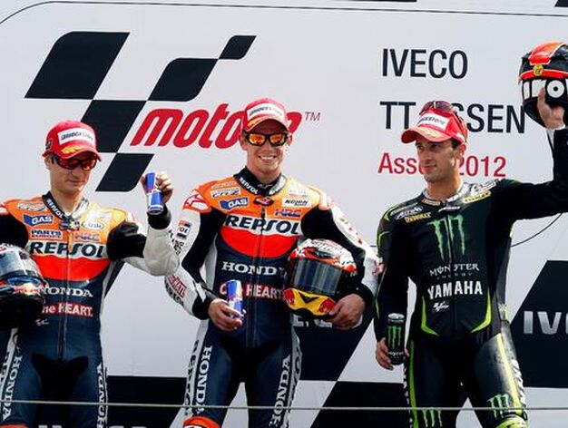 El podio del Gran Premio de Holanda de MotoGP, con Dani Pedrosa, Casey Stoner y Andrea Dovizioso.

Foto: AFP Photo