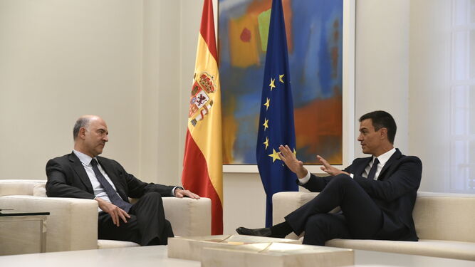 Moscovici y Sánchez, reunidos en La Moncloa.