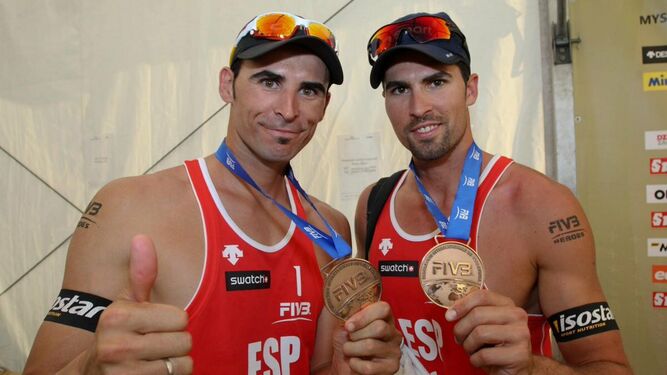 Herrera y Gavira lucen sus medallas de bronce en Doha.