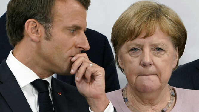 Emmanuel Macron y Angela Merkel.