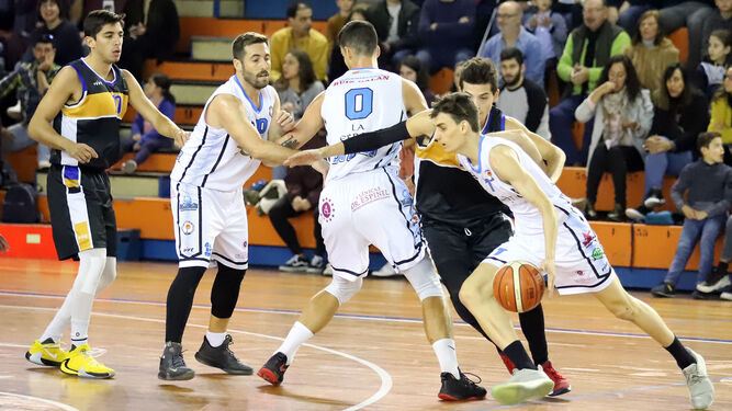 Las mejores fotos del partido de baloncesto Huelva - ULB