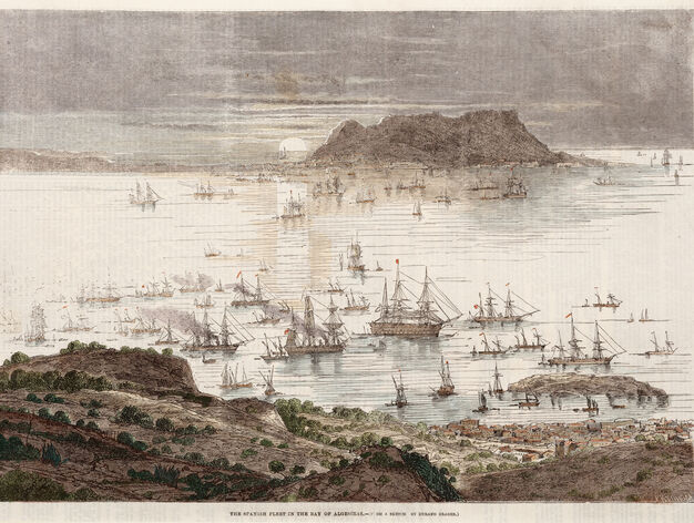 Vista panor&aacute;mica mostrando parte de la ciudad de Algeciras, la Isla Verde, su fondeadero con numerosas naves y embarcaciones de la flota espa&ntilde;ola, la bah&iacute;a algecire&ntilde;a y el Pe&ntilde;&oacute;n de Gibraltar al fondo. La Imagen en xilograf&iacute;a de imprenta coloreada. La estampa corresponde al n&uacute;mero se 29 de julio de 1861 de la publicaci&oacute;n peri&oacute;dica inglesa Illustrated Times.